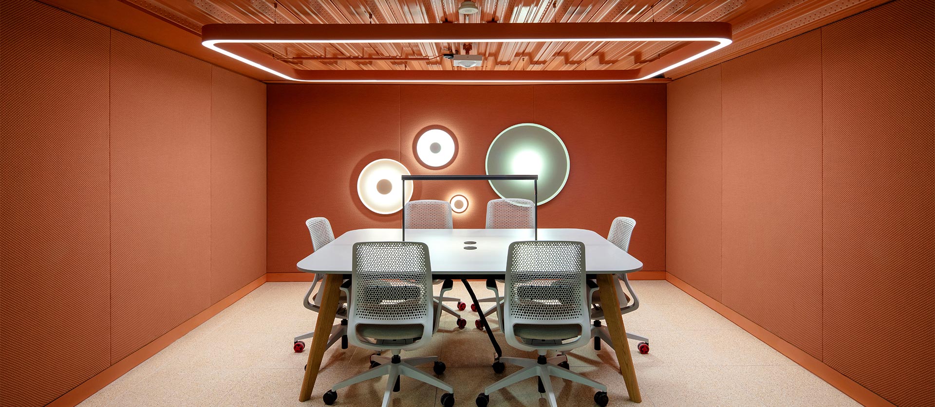 Orange coloured office meeting room